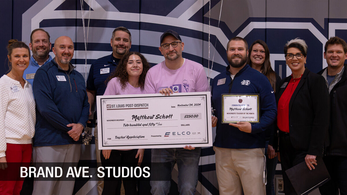 Photojournalism teacher captures photos, stories and the hearts of students